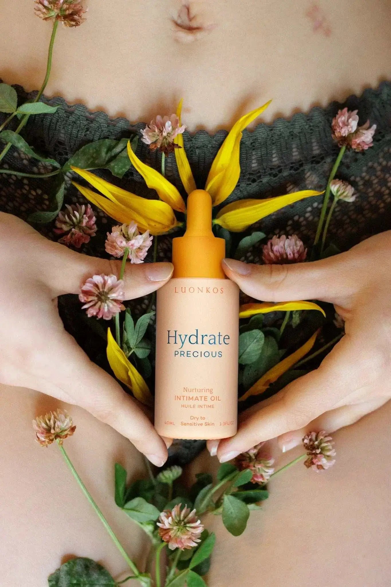 Luonkos Precious intimate oil lifestyle image – woman using natural plant-based intimate care product