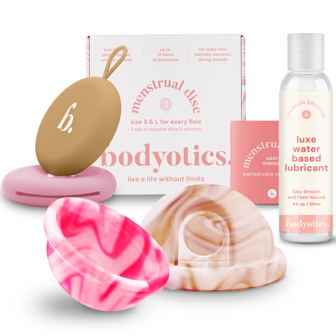 Water-based lube with menstrual disc set, featuring beige disc and lubricant bottle.