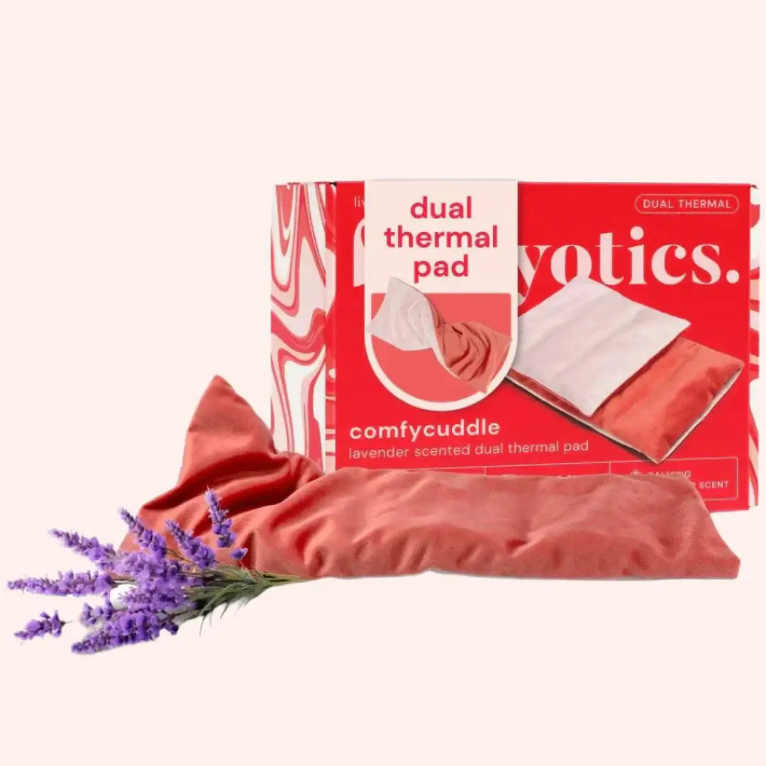 Bodyotics Comfycuddle heating pad for cramps with lavender scent, dual thermal design for warm or cold use, soft pink velvet cover.